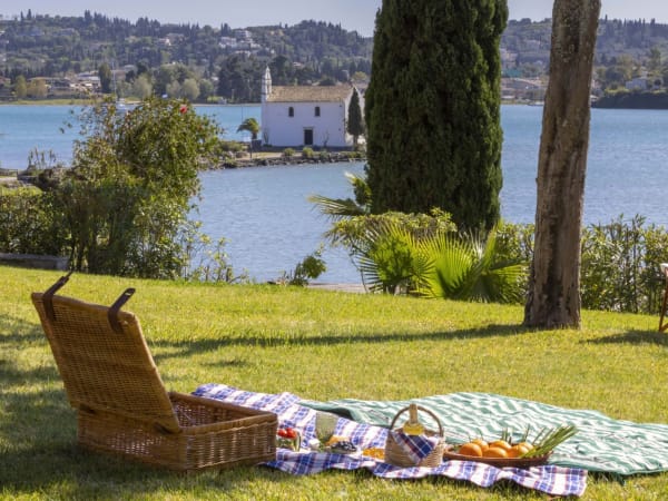 A shady spot with views of Gouvia Bay and the evocative church of Ypapanti.